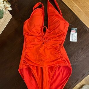 Never worn , Ralph Lauren orange one piece bathing suit !!!